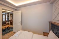 Postel nebo postele na pokoji v ubytování Dorne Suite Taksim Hotel