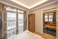 Postel nebo postele na pokoji v ubytování Dorne Suite Taksim Hotel