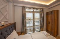 Postel nebo postele na pokoji v ubytování Dorne Suite Taksim Hotel