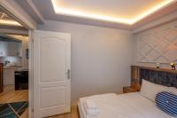 Postel nebo postele na pokoji v ubytování Dorne Suite Taksim Hotel