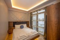 Postel nebo postele na pokoji v ubytování Dorne Suite Taksim Hotel