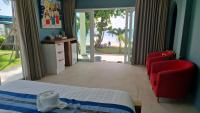 Ein Bett oder Betten in einem Zimmer der Unterkunft Le Petit Saint Tropez