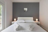 Posteľ alebo postele v izbe v ubytovaní Apartment S&S Deluxe Makarska
