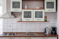 Una cocina o kitchenette en City Centar Apartments