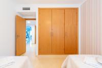 Posteľ alebo postele v izbe v ubytovaní Neptuno Malaga Apartamento de Lujo