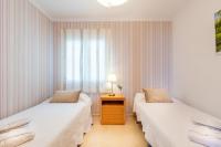Posteľ alebo postele v izbe v ubytovaní Neptuno Malaga Apartamento de Lujo