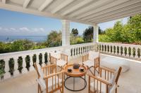 A balcony or terrace at Ionian Garden Villas - Villa Sol