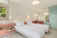 A bed or beds in a room at Ionian Garden Villas - Villa Sol
