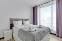 Posteľ alebo postele v izbe v ubytovaní Lion Apartments - Botanica
