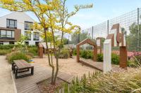 Vonkajšia záhrada v ubytovaní Lion Apartments - Botanica
