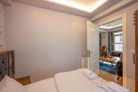 Postel nebo postele na pokoji v ubytování Dorne Suite Taksim Hotel
