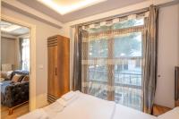Postel nebo postele na pokoji v ubytování Dorne Suite Taksim Hotel