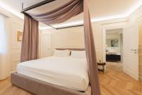 Posteľ alebo postele v izbe v ubytovaní Naxi Suites