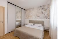 Posteľ alebo postele v izbe v ubytovaní Apartment Dolce D