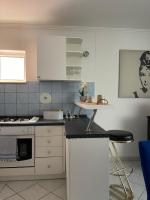 Kuchyňa alebo kuchynka v ubytovaní Providenca Apartments