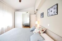 Posteľ alebo postele v izbe v ubytovaní Summer Breeze apartment