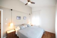 Posteľ alebo postele v izbe v ubytovaní Summer Breeze apartment