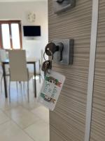 Televízia a/alebo spoločenská miestnosť v ubytovaní Amori di Sicilia