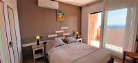 Postel nebo postele na pokoji v ubytování Suite & Spa Panoramic Olivars