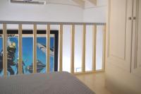 Posteľ alebo postele v izbe v ubytovaní Little Symi House