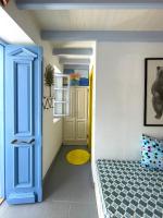 Posteľ alebo postele v izbe v ubytovaní Little Symi House