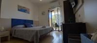 Posteľ alebo postele v izbe v ubytovaní Bellavista Rooms