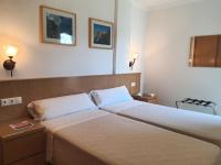 Posteľ alebo postele v izbe v ubytovaní APARTAMENTOS SERRELLA - Rural Guadalest