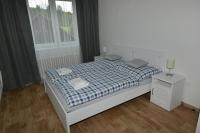 Postel nebo postele na pokoji v ubytování Apartmány u Pešlů