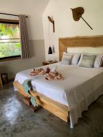Postel nebo postele na pokoji v ubytování KALUME' Eco Boutique Resort-Adult only