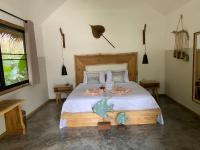 Postel nebo postele na pokoji v ubytování KALUME' Eco Boutique Resort-Adult only