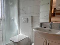 Kúpeľňa v ubytovaní Apartments Krivic