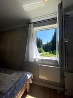 Postel nebo postele na pokoji v ubytování Tiny house