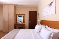 Postel nebo postele na pokoji v ubytování Faros Luxury Suites
