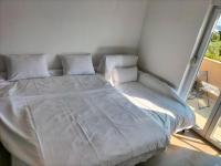 Posteľ alebo postele v izbe v ubytovaní Apartman Hanna