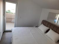 Posteľ alebo postele v izbe v ubytovaní Apartman Hanna
