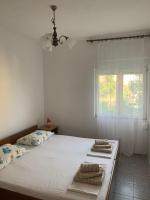 Posteľ alebo postele v izbe v ubytovaní Apartment Jure