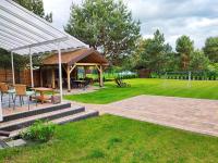 Vonkajšia záhrada v ubytovaní Mazury całoroczny dom do wynajęcia nad jeziorem