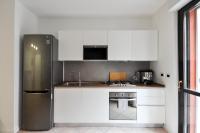 A kitchen or kitchenette at CaseOspitali - Casa Cri&Eli, super trilocale con terrazzo in zona Lambrate per 5