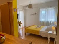 Postel nebo postele na pokoji v ubytování Apartments A&A