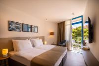 Posteľ alebo postele v izbe v ubytovaní Maistra Select Funtana All Inclusive Resort
