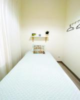 Postel nebo postele na pokoji v ubytování Marzia Boutique Home