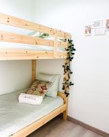 Postel nebo postele na pokoji v ubytování Marzia Boutique Home