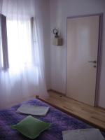 Postel nebo postele na pokoji v ubytování ADRIA