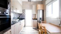 Kuchyň nebo kuchyňský kout v ubytování Marzia Boutique Home