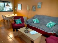 Posedenie v ubytovaní Apartamento con encanto, terraza y parking cubierto