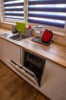 Kuchnia lub aneks kuchenny w obiekcie Lazurowe Apartamenty