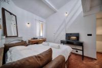 Łóżko lub łóżka w pokoju w obiekcie IMMOGROOM - Cosy - Renovated duplex - Close to the beach