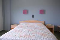 Posteľ alebo postele v izbe v ubytovaní Eri Rooms to Let