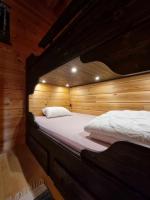 Postel nebo postele na pokoji v ubytování Trollvang, hytte med pool og sauna
