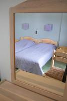 Posteľ alebo postele v izbe v ubytovaní Eri Rooms to Let
